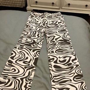 Swirly pattern, denim jeans.